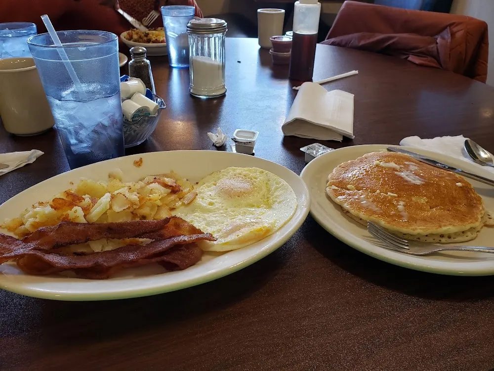 Eggs Bacon American Fries and Pancakes